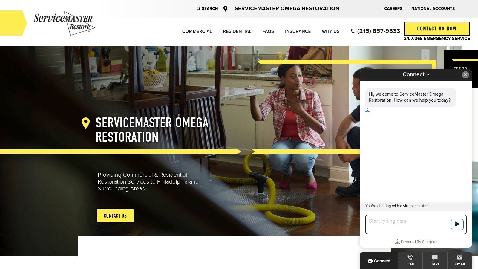 A Servicemaster Restore Van Parked Outside A Residential Home, Indicating Their Readiness For Service.